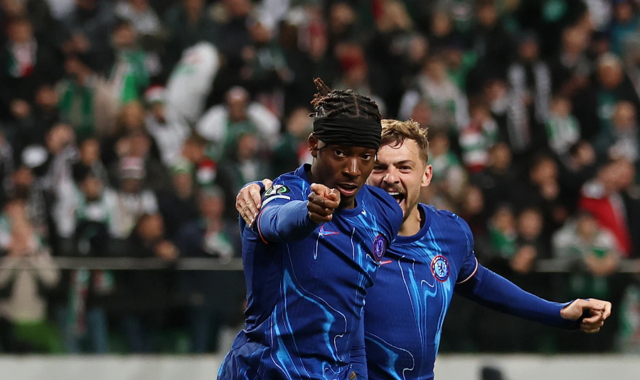 Chelsea players Noni Madueke and Kiernan Dewsbury-Hall celebrating a goal against Legia Warsaw