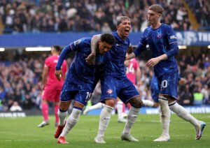 Jadon Sancho celebrating with teammates after scoring for Chelsea against Ipswich