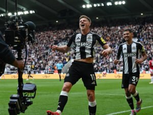 Newcastle player Harvey Barnes celebrating goal against Manchester United