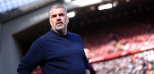 Tottenham boss Ange Postecoglou standing in a stadium