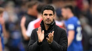 Mikel Arteta clapping at the end of a football match