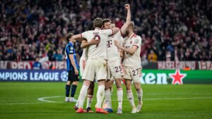 Bayern Munich forwards Thomas Muller and Harry Kane celebrating equaliser against Inter Milan