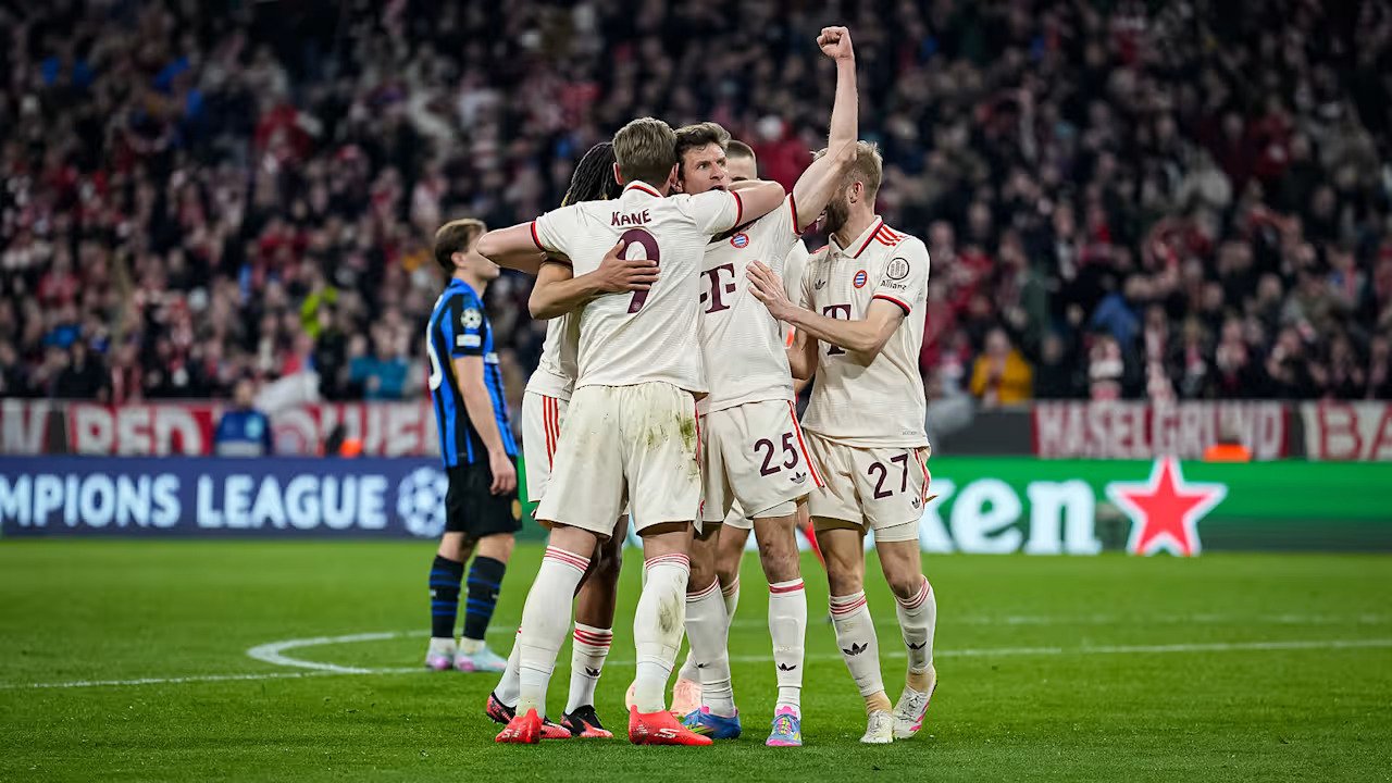 Bayern Munich forwards Thomas Muller and Harry Kane celebrating equaliser against Inter Milan
