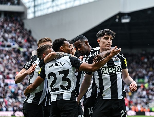 Newcastle players celebrating after their victory over Ipswich