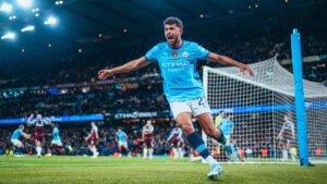 Manchester City player Matheus Nunes celebrating his late winner against Aston Villa