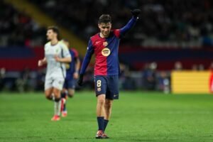 Barcelona midfielder Pedri walking on the pitch at Camp Nou