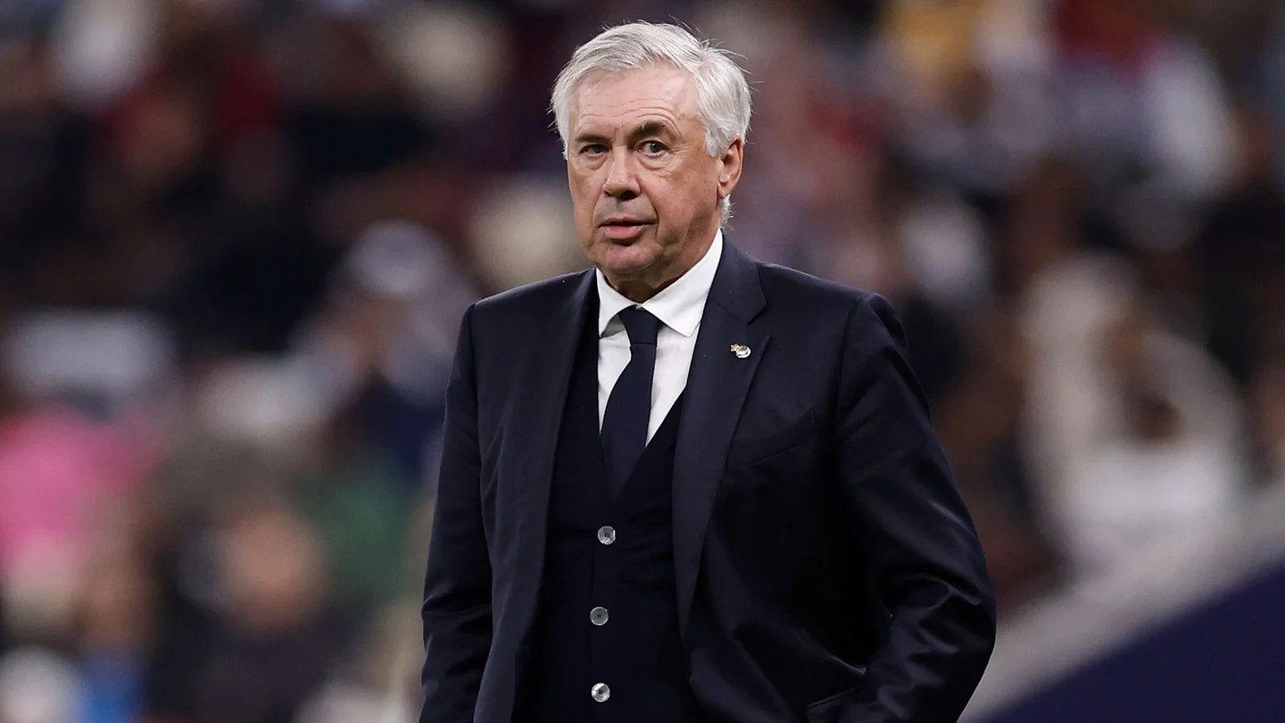 Real Madrid boss Carlo Ancelotti watching a game in a stadium