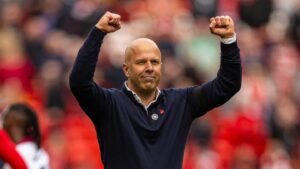 Liverpool head coach Arne Slot fist-pumping at Anfield