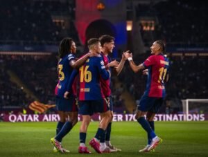 Barcelona players celebrating a goal at the Estadi Olimpic
