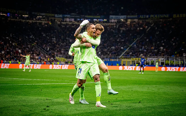 Barcelona player Raphinha celebrates after firing team ahead 3-2 with three minutes to go in normal time