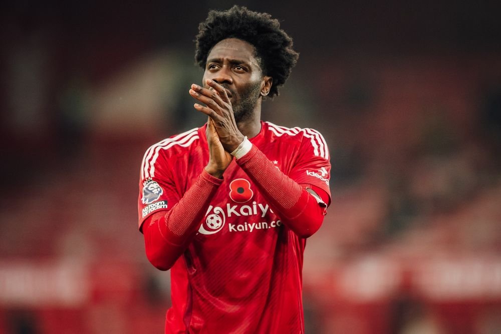 Nottingham Forest defender Ola Aina applauding fans after a match