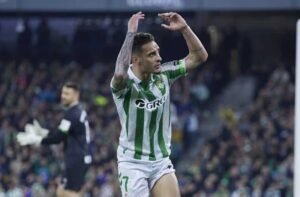 Manchester United and Real Betis winger Antonymotioning towards fans during a Europa League game