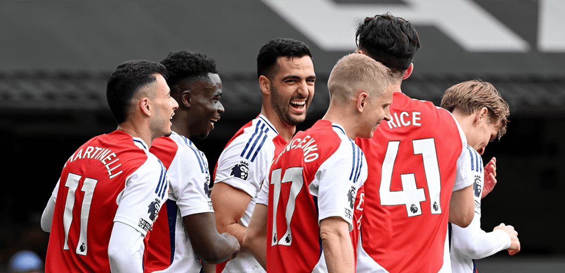 Arsenal players celebrating a goal in the Premier League