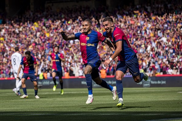 Barcelona players celebrating a goal against Real Madrid