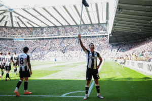 Newcastle midfielder Bruno Guimaraes celebrating a goal against Chelsea at St James's Park