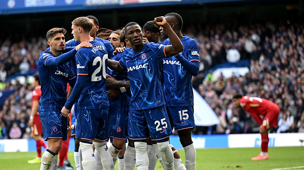 Chelsea squad celebrating a goal against Liverpool at Stamford Bridge