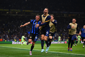 Inter Milan player Davide Frattesi with teammates celebrating his winner against Barcelona at the San Siro
