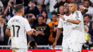 Real Madrid squad celebrating a goal at El Clasico