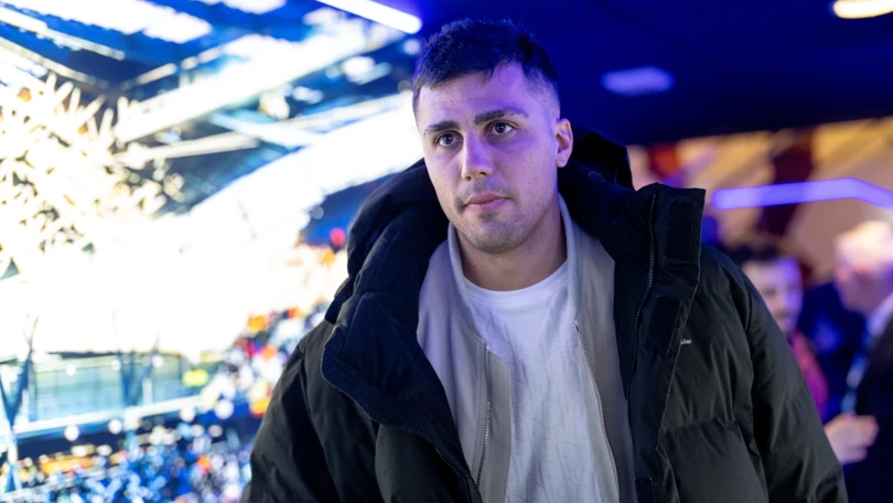 Manchester City midfielder Rodri in the stands at the Etihad Stadium