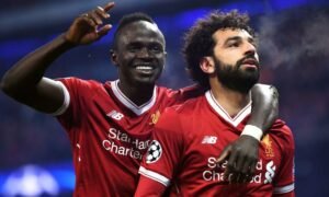 Sadio Mane celebrating a Liverpool goal with teammate Mohamed Salah.