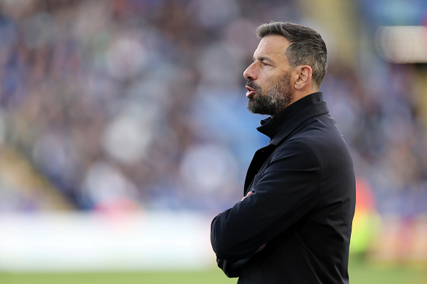 Leicester manager Ruud van Nistelrooy watching a game from the sidelines
