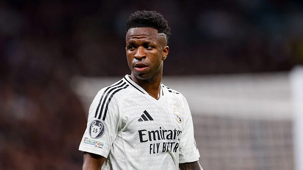 Real Madrid winger Vinicius Junior walking during a football match