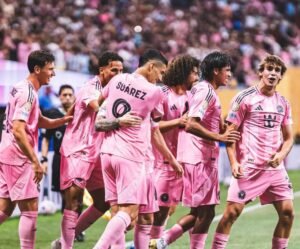 Inter Miami players celebrating with Lionel Messi after his goal