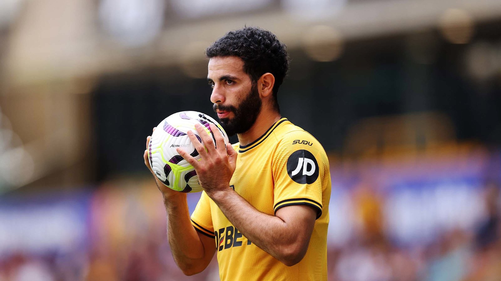 Rayan Ait-Nouri holding the ball during a match for Wolves in the Premier League