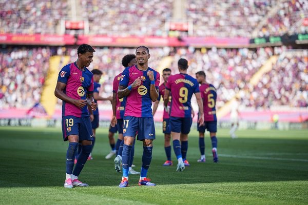 Barcelona players celebrating a goal in La Liga