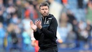 Michael Carrick applauding Middlesbrough fans after a Championship match
