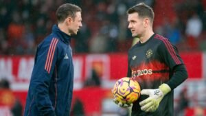 Tom Heaton and Johnny Evans during a Manchester United training session