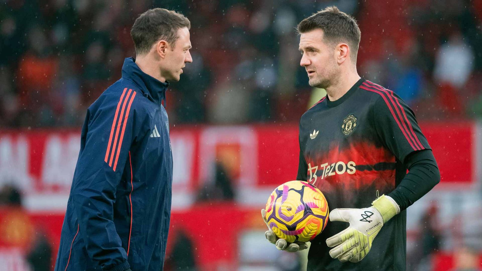 Tom Heaton and Johnny Evans during a Manchester United training session