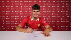 Milos Kerkez signing his Liverpool contract