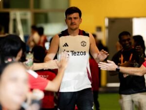 Manchester United defender Harry Maguire greeting fans in Kualar Lumpur.