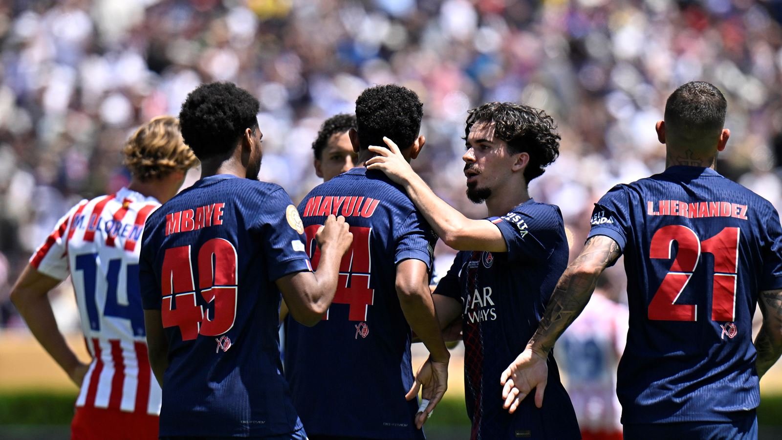 PSG players celebrating a goal against Atletico Madrid