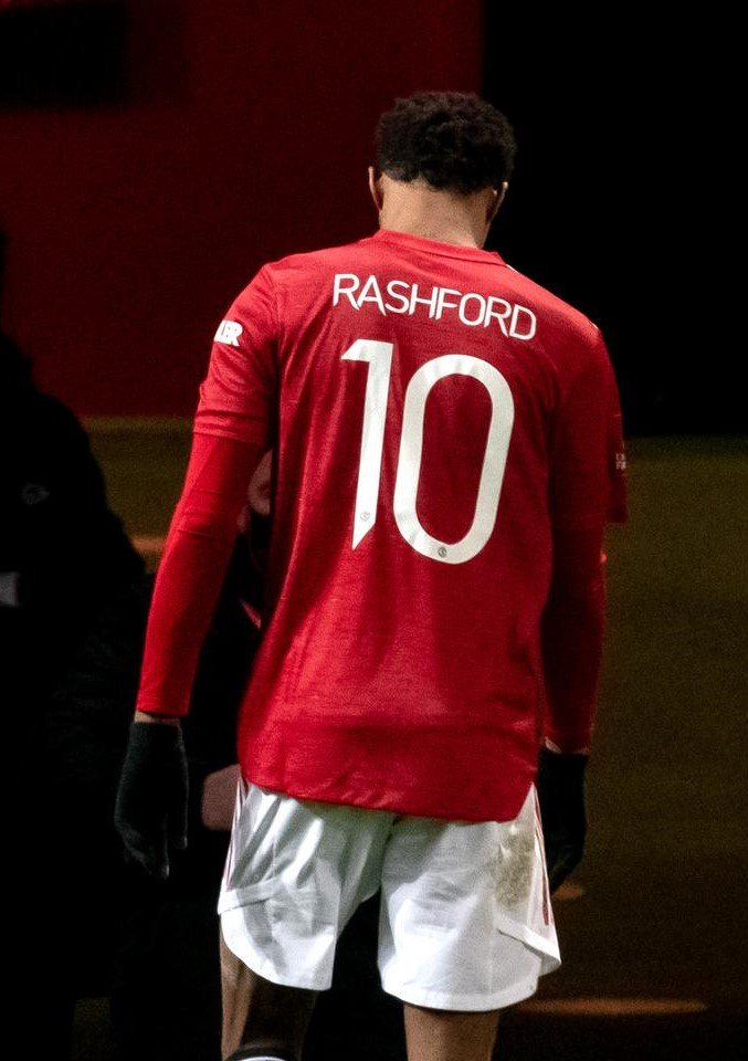 MANCHESTER, ENGLAND - JANUARY 24: Marcus Rashford of Manchester United walks off at the end of the Emirates FA Cup Fourth Round match between Manchester United and Liverpool at Old Trafford on January 24, 2021 in Manchester, England. Sporting stadiums around the UK remain under strict restrictions due to the Coronavirus Pandemic as Government social distancing laws prohibit fans inside venues resulting in games being played behind closed doors. (Photo by Ash Donelon/Manchester United via Getty Images)