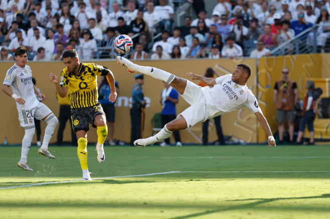Kylian Mbappe acrobatically scoring for Real Madrid