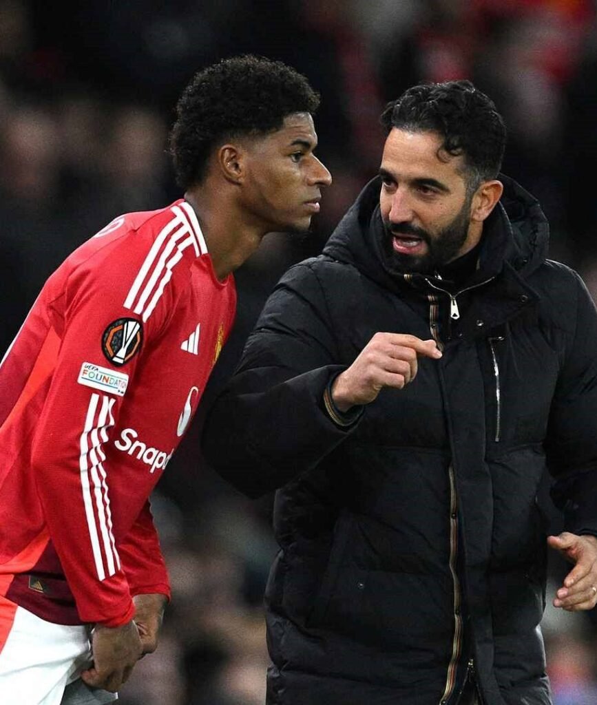 Marcus Rashford receiving instructions from Manchester United head coach Ruben Amorim