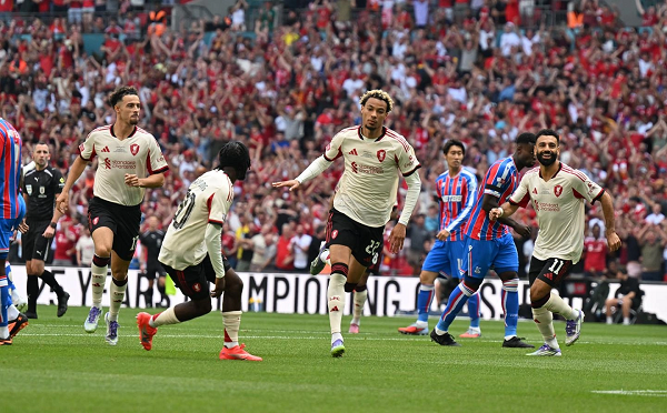 Hugo Ekitike (centre) wheeling off in celebration after scoring the opener against Crystal Palace.