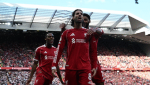 Liverpool midfielder Dominik Szoboszlai celebrating a goal with his teammates