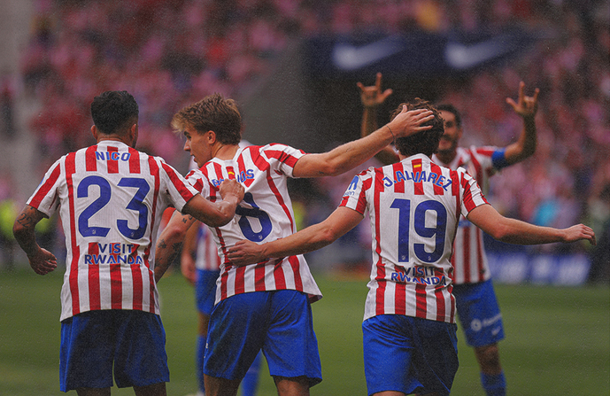 Atletico Madrid players celebrating a goal against Real Madrid