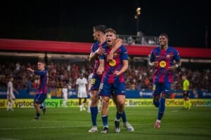 Fermin Lopez celebrating with the Barcelona squad against Valencia