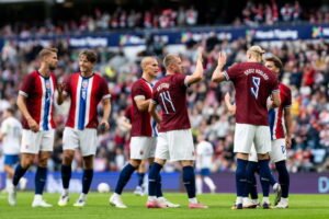 Erling Haaland celebrating with teammates in world cup qualifiers