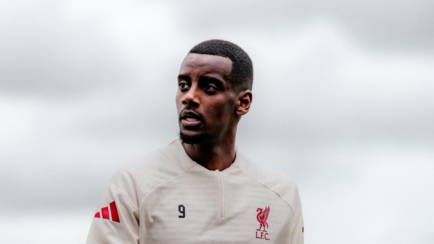 Alexander Isak wearing white Liverpool training kit