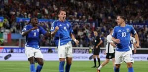 Italy team celebrating a goal in the World Cup qualifiers