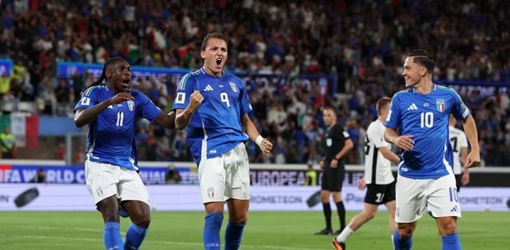 Italy team celebrating a goal in the World Cup qualifiers