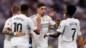 Real Madrid players celebrating a goal