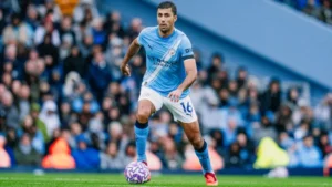 Manchester City midfielder Rodri on the ball during a Premier League game