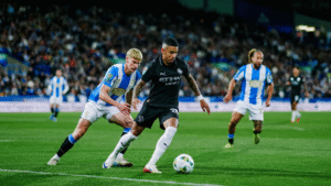 Savinho in possession for Manchester City against Huddersfield