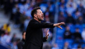 Atletico Madrid manager Diego Simeone marshalling his side from the sidelines during a La Liga game